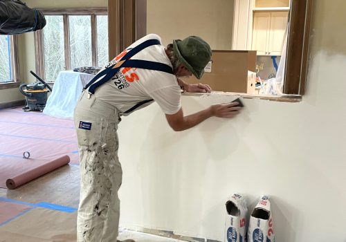 painting contractor sands drywall
